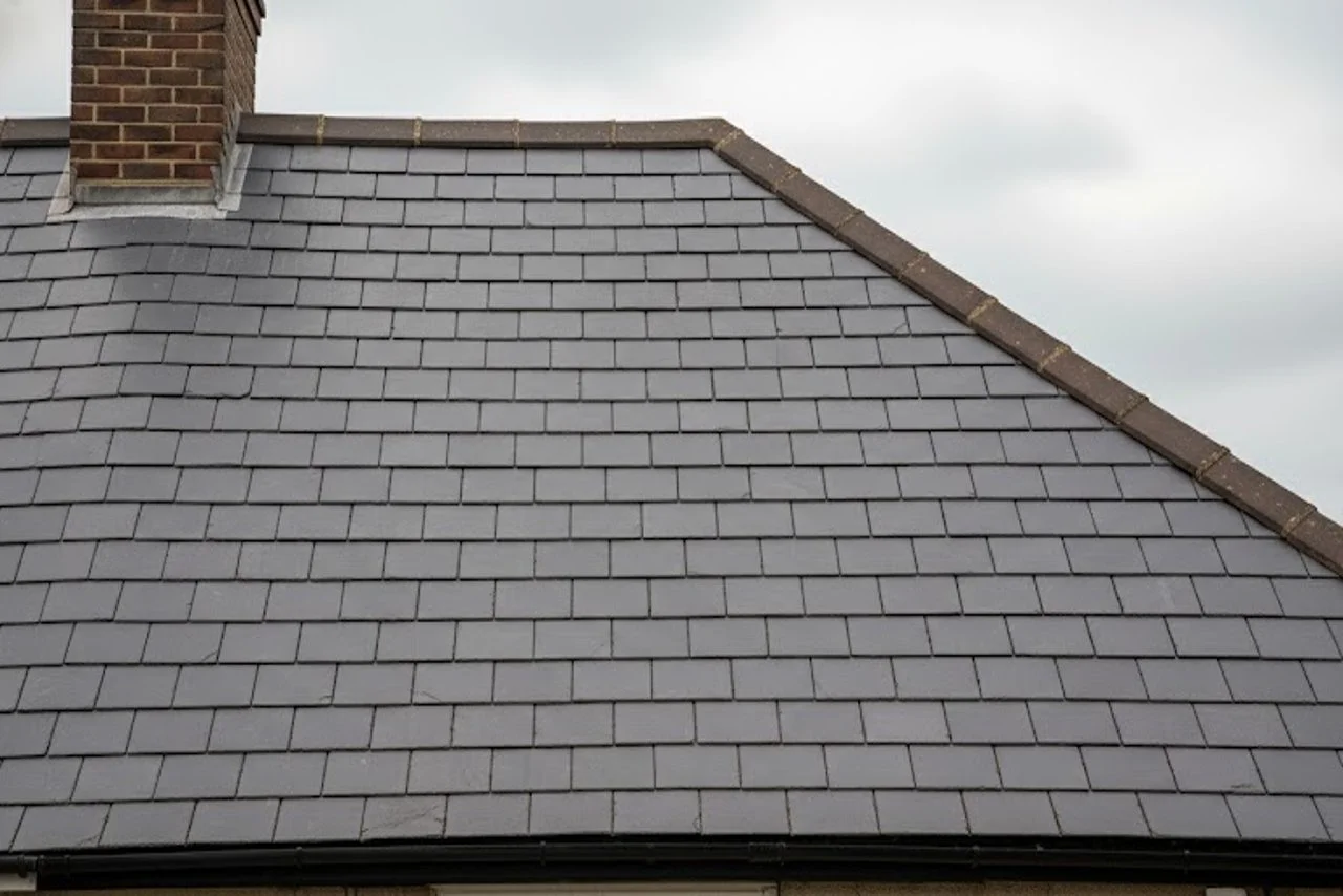 London roof replacement completed with new high-quality slate tiles, restored structural integrity, and enhanced weather protection