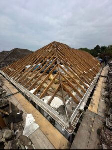 New wooden roof trusses and rafters installed during roof replacement project in Tyne and Wear