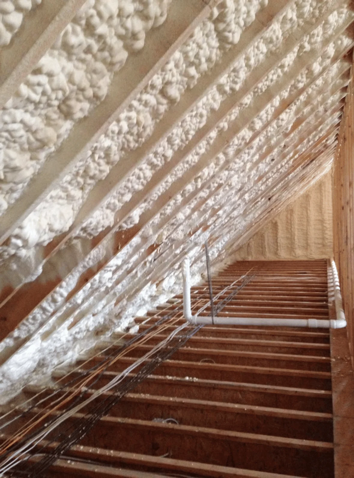 Loft spray foam insulation on roof rafters Nottingham - attic insulation removal and installation services