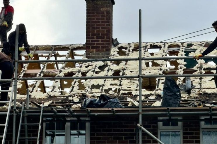 Spray foam insulation removal in Cambridgeshire, professional roof insulation extraction and timber treatment by local roofing contractors with scaffolding