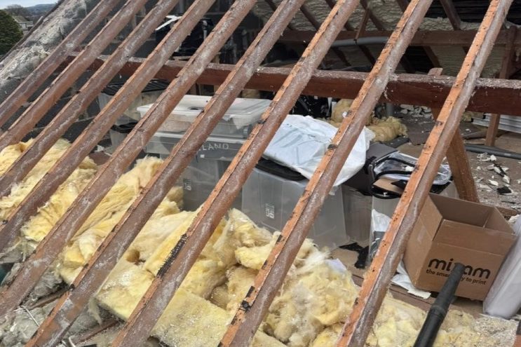 Spray foam insulation removal in Oxfordshire showing exposed timber rafters and removed loft insulation, professional roof restoration service