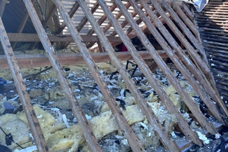 Spray foam insulation removal in Shropshire showing exposed timber rafters and loft clearance, professional roof restoration service